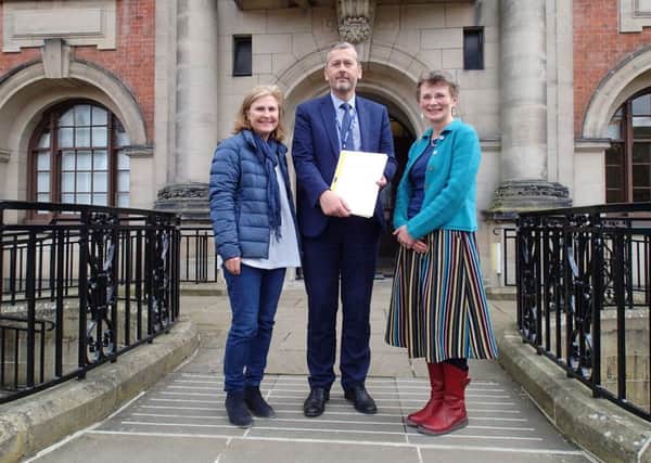 School governor Maria Farrer and Jill Gates, member of the Clapham Community Action Group, presented the action plan and petition to Stuart Carlton, corporate director of Children and Young People's Service at County Hall, Northallerton, on April 4 2019.