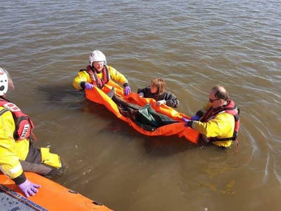 Morecambes volunteer RNLI hovercraft crew rescued a stranded porpoise across the bay at Humphrey Head on Thursday, April 11.