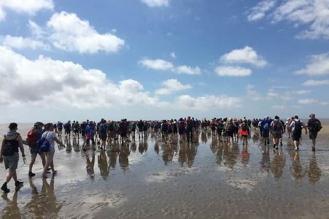 FAMILIES and businesses are being asked to put their best foot forward and take part in a walk across Morecambe Bay to raise funds for Derian House Childrens Hospice.

The Morecambe Bay Walk 2018 will be led by the Queens official guide to the sands, Cedric Robinson MBE, and aims to raise a record-breaking amount for the charitys silver anniversary year.

Derian fundraisers are hoping to get 250 intrepid walkers to make the journey, to mark 25th years of supporting children and young people with life-limiting conditions and their families.

The walk takes place on Sunday, August 19 from 11.30am. Setting off from Arnside Promenade and arriving at Kents Bank, the walk is approximately eight miles and takes around three hours.