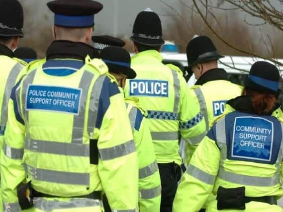 Seven Lancashire Police officers were taken to hospital after being sprayed with ammonia fluid during a raid in Darwen. A sergeant suffered serious injuries to his eyes which may require surgery.