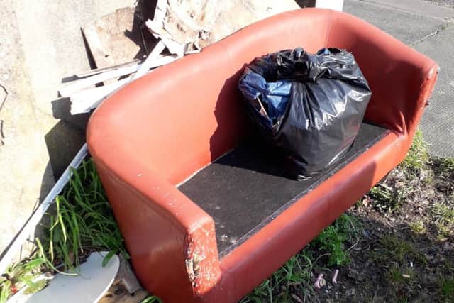 A wrecked sofa has been dumped in an alleyway near Regent Park Road in Morecambe.