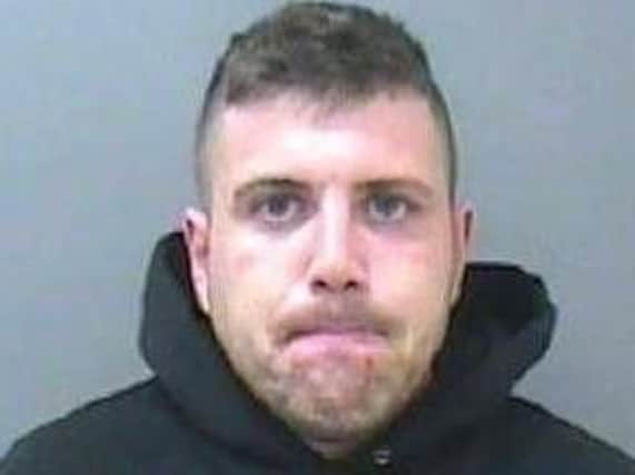 Brendan Harrington, 35, is wanted on suspicion of criminal damage, assault and recall to prison.