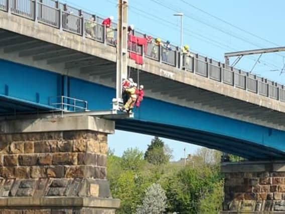 Leanne Marie Owens sent us this photo of the man being rescued from Carlisle Bridge after becoming stuck while taking photos.