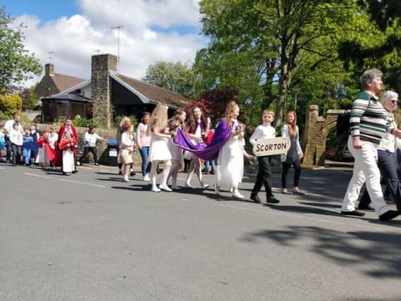 The Rose Queen procession marched through the Wyre village