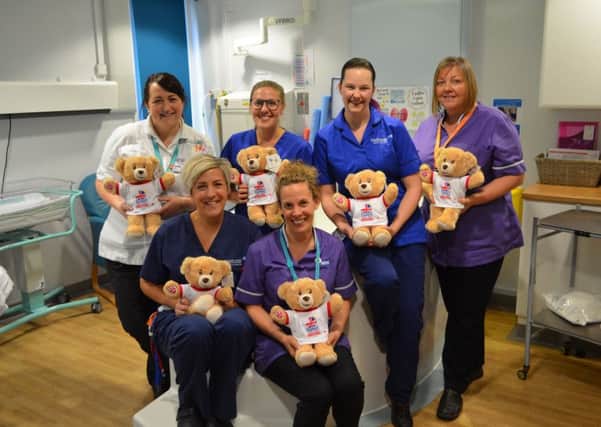 Staff at the Royal Lancaster Infirmary with some of the bears donated to hospitals across the country.