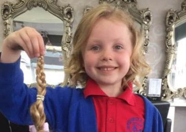 Jessica Howard has had her hair cut off to donate to the Little Princess Trust. She has also raised over £1000 to donate to the trust.