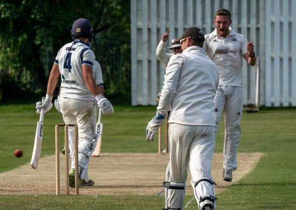 Garstang bowler Danny Gilbert celebrates taking a wicket     Picture: Tim Gilbert/Preston Photographic Society