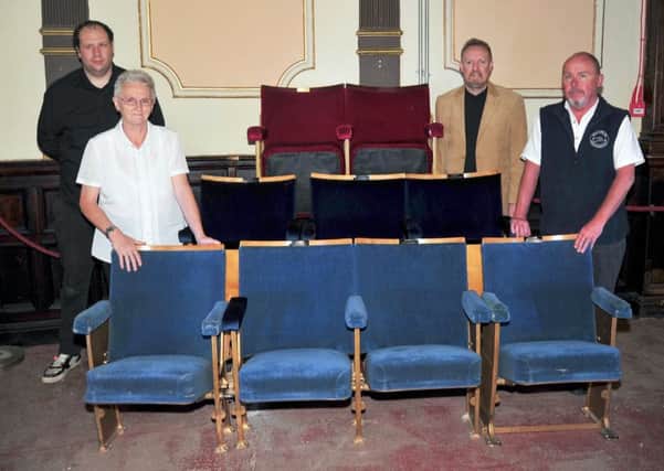 from left, Kieron Lowler, Winter Gardens Committee member, Susan Lomax, Winter Gardens Trustee, Stephen Jones, Chair of Friends of the Winter Gardens and John O'Neill Morecambe BID manager with the new seats for the Winter Gardens, Morecambe