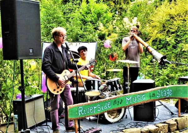 Greenheart performing on the Riverside Stage in 2018