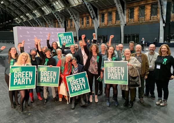 The Greens - with Gina Dowding in the centre - celebrate at the EU election count.