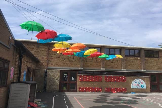 The Umbrella Project Installation, sponsored by local businesses, Yololets Properties, Tony Smith Builder, Asda, Lancaster Teaching Agency, Thorntons and Lancaster Printing and Carefoot.