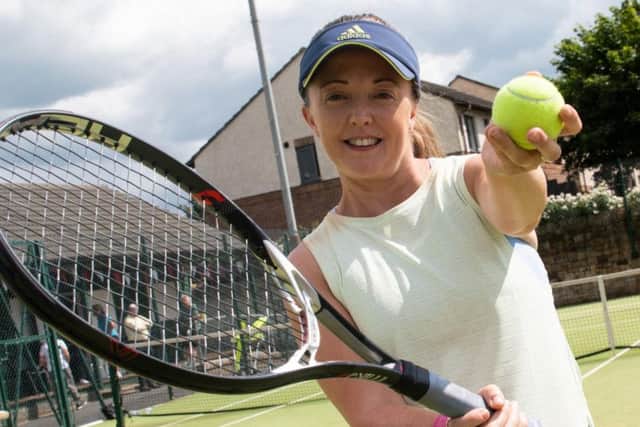 Robyn Moore, who suffers from Post Traumatic Stress Disorder (PTSD), is aiming to hit more tennis balls in one month than any other tennis player has done. Photo: Kelvin Stuttard