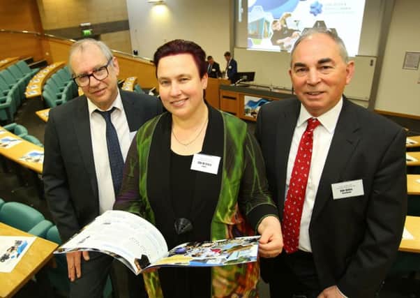 Councillor Derek Brook, chairman of Barrow Borough Council's Executive Committee; Councillor Dr Erica Lewis, Leader of Lancaster City Council; and Councillor Giles Archibald, Leader of South Lakeland District Council; with the Lancaster and South Cumbria Economic Region prospectus