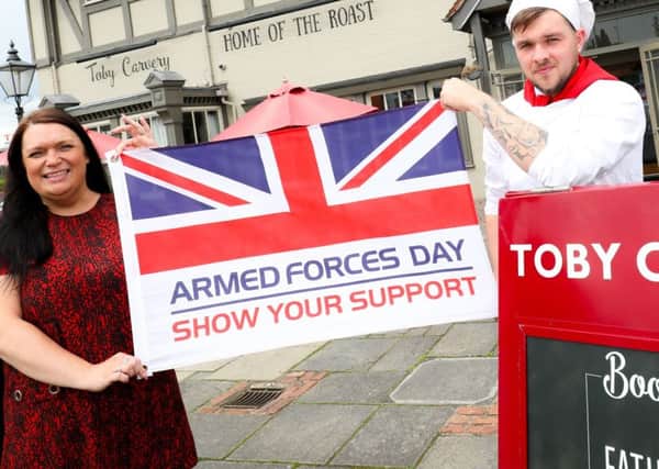 Press photography for Toby Carvery Armed Forces Day 2019 campaign. Pictured are Hannah Roper (General Manager), Phill Mills (Head Chef), and Casey Tromans (Front of house staff).  Picture by Shaun Fellows / Shine Pix Ltd . Picture by Shaun Fellows / Shine Pix