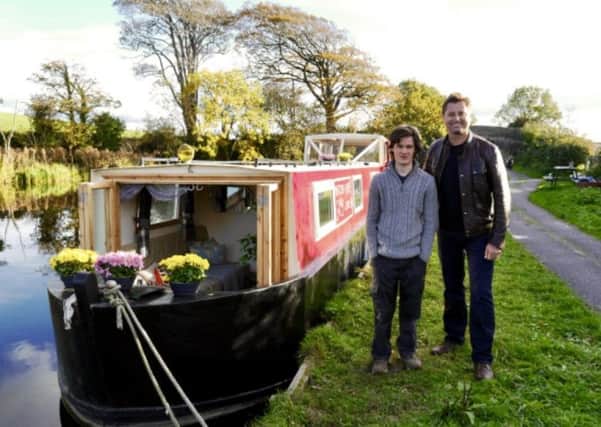 Billy Walden with TV presenter George Clarke next to the canal boat he restored, MatildaJayne.
