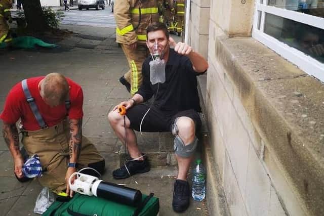 Matt Snelling receiving treatment following the fire at Jo and Cass