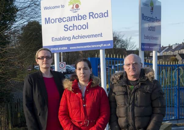 Lizzi Collinge with parents Nicola and Bob outside Morecambe Rd School.jpg