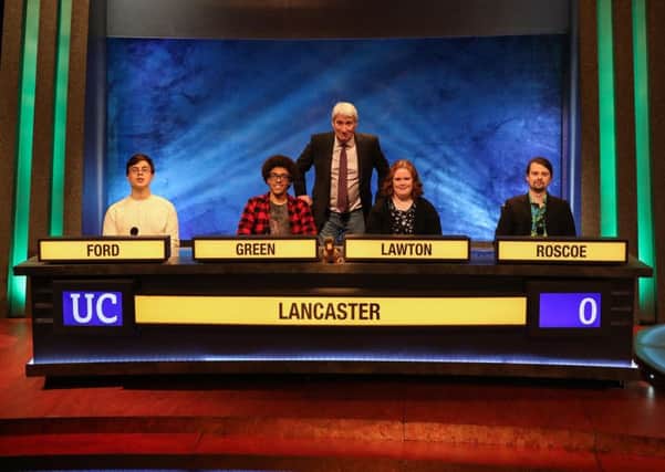 The Lancaster University team on University Challenge with host Jeremy Paxman.