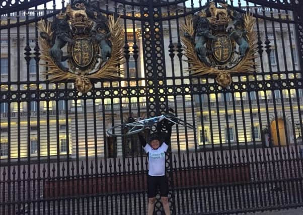 Rachael Edmonds from Hest Bank arriving at Buckingham Palace after cycling from Lancaster to London in only three days in memory of her father who was cared for at the end of his life at St Johns Hospice.