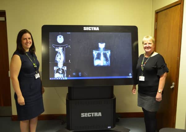 Emma Jackson and Christine Spry with the SECTRA table.