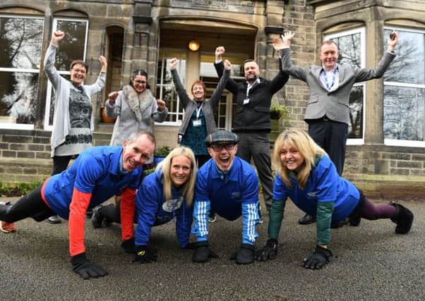Photo Neil Cross
Steve Cody is doing the "cha cha slide plank" every day in 2019 to raise money for Cancercare, with supporters Angus Murray, Andrea Partridge and Anna Goddard and staff at Cancercare
