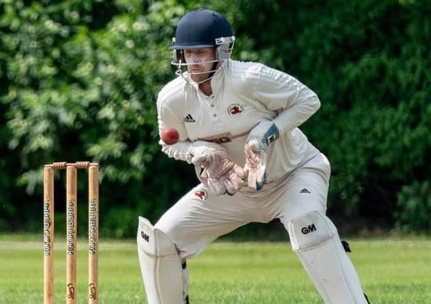 Garstang wicketkeeper Matt Crowther takes the ball       Picture: Tim Gilbert/Preston Photographic Society