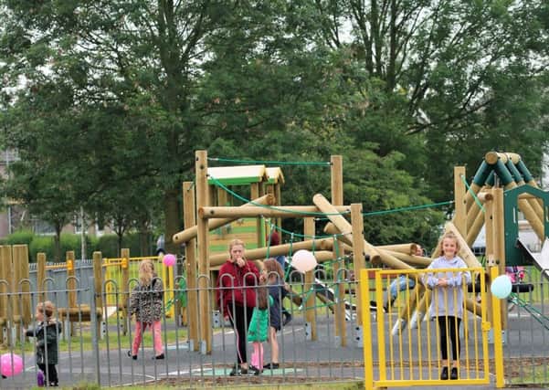 Children enjoying the new play park in Galgate.