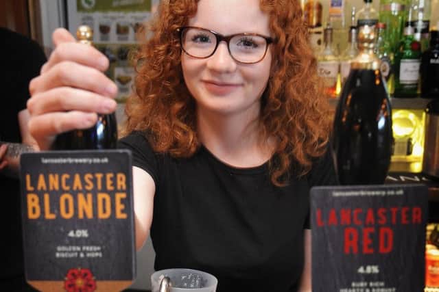 Lancaster food and drink festival held in and around Lancaster Brewery.
Niamh Aspinall pulls another pint of Lancaster's finest.  PIC BY ROB LOCK
5-5-2019
