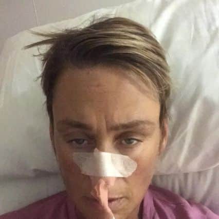 Emma Ellis in hospital during her treatment.