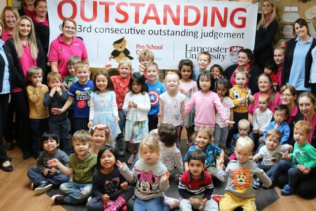 Staff and pupils at Lancaster University pre-school celebrate their Ofsted. Photo by Ben Bibby.