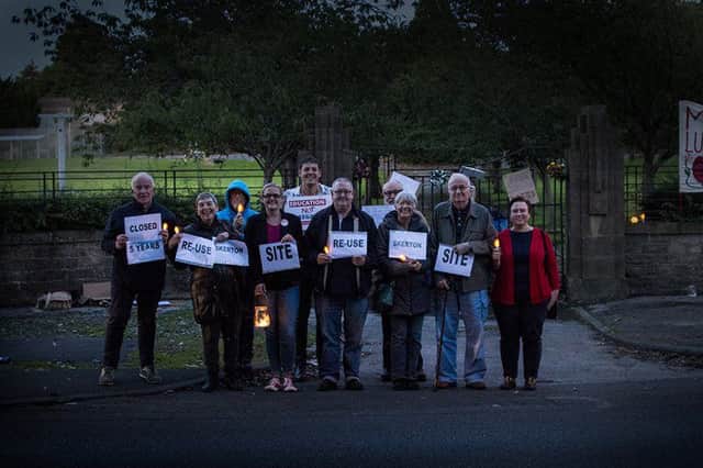 Councillors hold a vigil outside the now closed Skerton High School