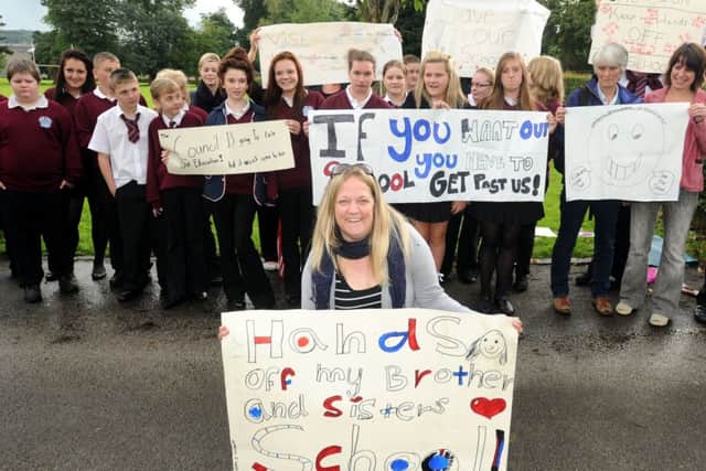 Pupils and supporters with Robyn Holtam from the Parents Action Group, protesting against the proposed closure of Skerton High School.
