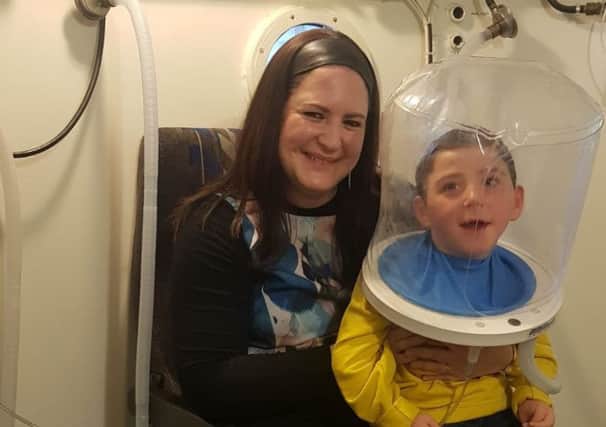 Sarah Daphner and her son Tazif who travel every day from Manchester for oxygen treatment.