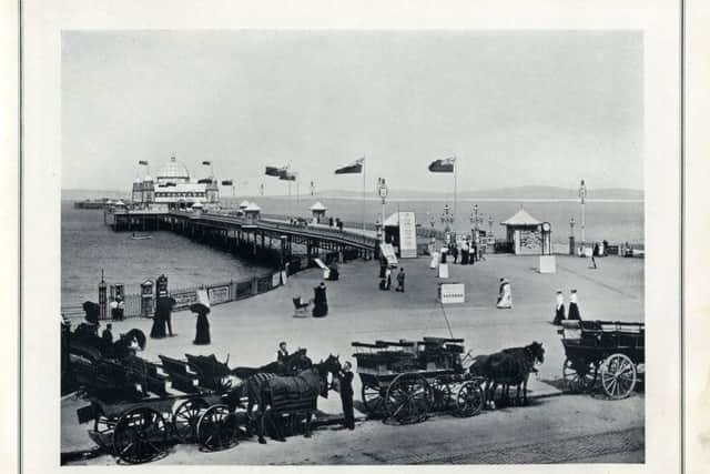 The West End Pier, gay with Union Jacks flying out in the breeze, is undoubtedly the finest, and is not altogether unsuggestive of the West Pier at Brighton. With its up-to-date appliances and graceful appearance it forms a somewhat striking contrast to its neighbour.