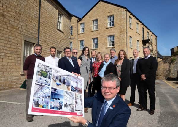 Fraser House, South Road, Lancaster, Lancashire.
County Councillor Michael Green, as well as reps from our economic development team, and some representatives from private sector who work in the digital sector.
The building is going to be renovated to provide a base for businesses who work in the digital sector.