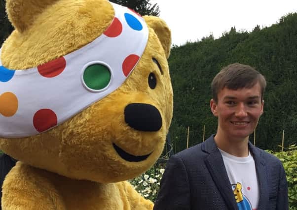 BBC Children in Need's Pudsey Bear with Josh Marshall who is in Team Rickshaw.