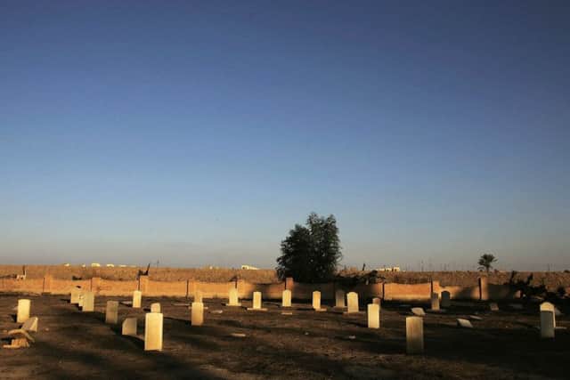 CAMP HABBANIYAH, IRAQ - JANUARY 30:  Grave markers still stand in a British cemetery January 29, 2006 on the grounds of the now American-occupied Camp Habbaniyah, Iraq.  "Habbaniya" was a British-built airbase, created during the British occupation of Iraq in the 1920s and kept for strategic reasons even after Iraq became a sovereign country in 1930.  When Iraq staged a coup and declared an alliance with Germany in April 1941, Britain and Iraq (with German help) fought a two-month war for control of Habbaniya, which Britain won.  British forces finally pulled out in the 1950s, but the battered and neglected churches, pools, and theaters that remain are reminders of Great Britain's long and stormy experience in militarily occupying Iraq.  (Photo by Chris Hondros/Getty Images)