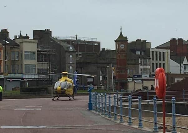 The air ambulance landing on the prom on Monday morning. Photo by Deborah Jane Parker-Bowles.