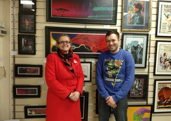 Lizzi Collinge with Tom Chesters at Bay Framing in Morecambe.