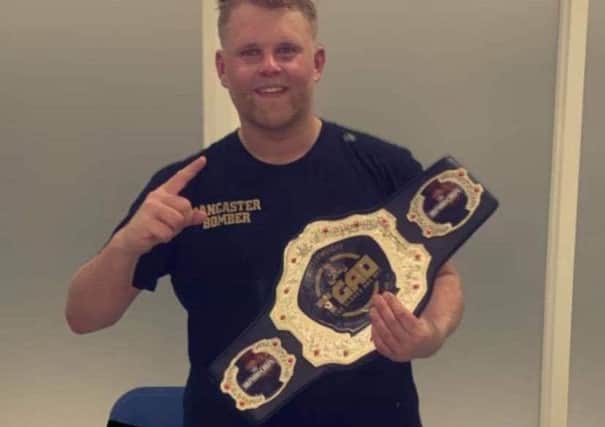 Jamie Proctor with his cruiserweight belt.