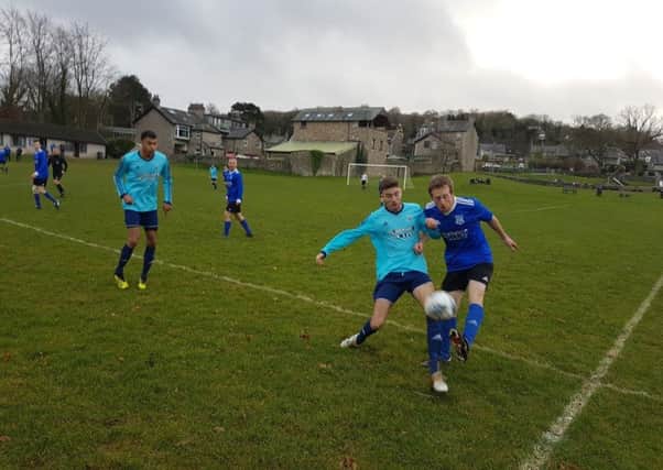 Arnside (dark blue) v Highgrove in the North Lancs Football League Premier Division. Picture: Michael Ball.
