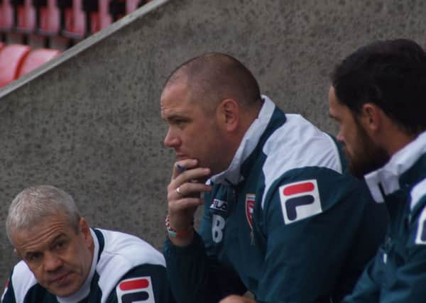 Ken McKenna, Jim Bentley and Stewart Drummond ponder their next move against Exeter.