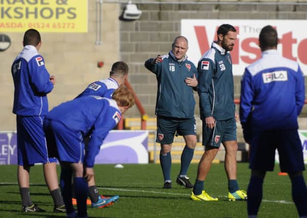 Jim Bentley hands out instructions during an open training session at the Globe Arena.