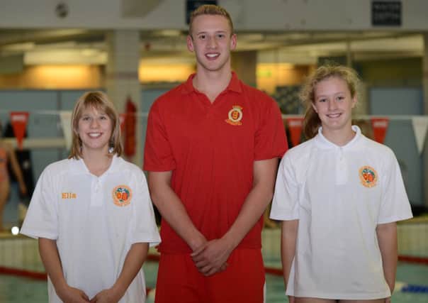 Carnforth Otters swimmers Ella Mounsey,  Josh Thompson and Hannah Edwards.