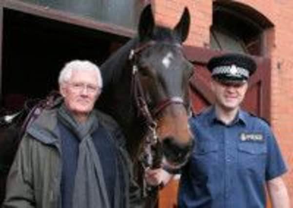 PC Dave Palmer-Davies with police horse Pendle and the illustrator of the books,  Michael Miller.