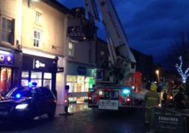 Part of Cheapside in Lancaster was closed off whilst firefighters removed a loose roof tile.