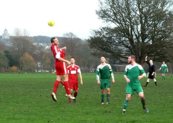 Lancaster Rovers v Carnforth Rangers on Ryelands Park on Saturday. The final score was 4-3 to Lancaster Rovers. Pictured is Matt Clapp of Carnforth Rangers heading the ball away.