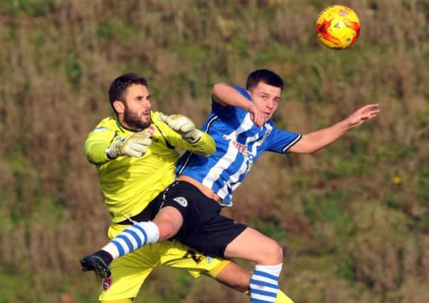 Morecambe's Andreas Arestidou returned from injury for the reserves at Wigan.