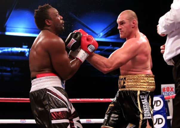 Tyson Fury (right) in action against Dereck Chisora during their Eliminator match for the WBO World Heavyweight Championship and British and European heavyweight Championships at the ExCel Arena, London. Picture: Nick Potts/PA Wire
