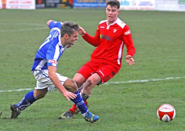 Tom Kilifin looks for an opening on his return to the Lancaster City side. Picture: Tony North